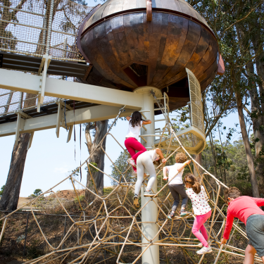 Children climbing at Bay Area Discovery Museum