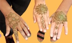 Hands with henna tattoo designs
