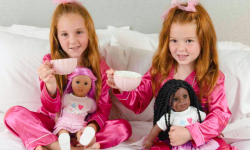 Little girls and dolls at holiday tea party