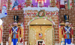 Life-sized holiday gingerbread house decorated for Christmas at Fairmont San Francisco.