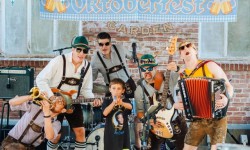 Oktoberfest at Brewsters Beer Garden kid yodeling with Bavarian band