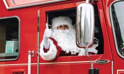 Santa in red fire engine