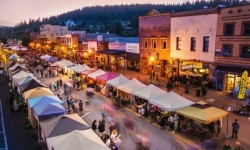 Downtown Truckee street in evening with vendors