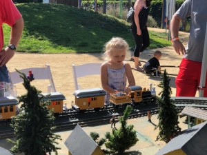Child with garden scale train