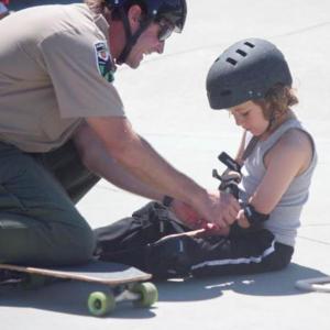 Ranger helping a skater