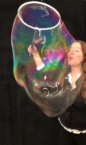 Woman with giant bubble