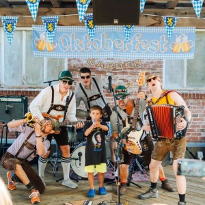 Oktoberfest at Brewsters Beer Garden kid yodeling with Bavarian band