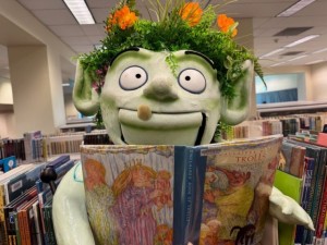 Wylding Woods monster puppet with book