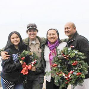 family with wreaths