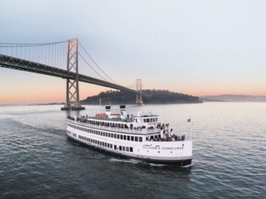 Hornblower boat and San Francisco Bay Bridge