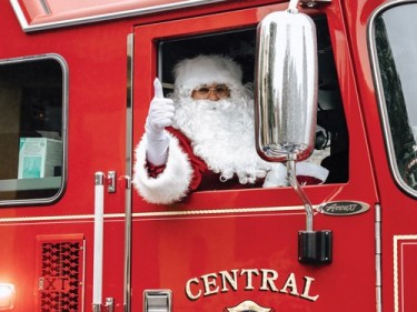 Santa in red fire engine