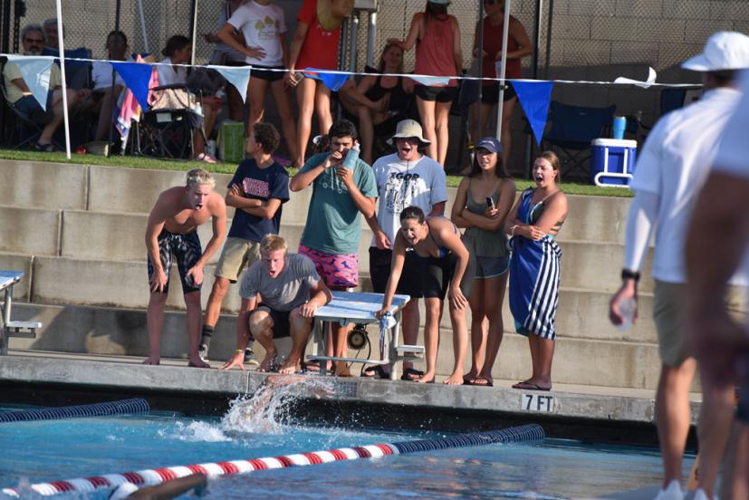 Swimmers cheering each other on