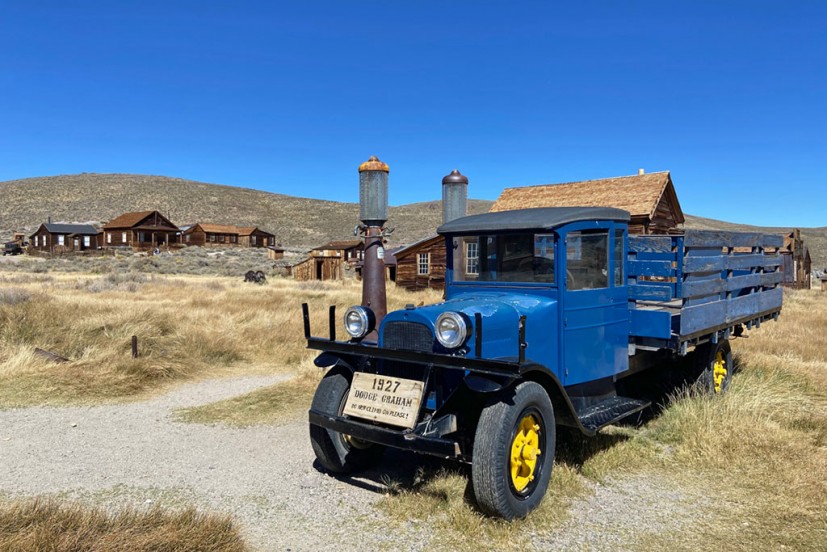 old blue pickup truck near gas pumps in Bodie