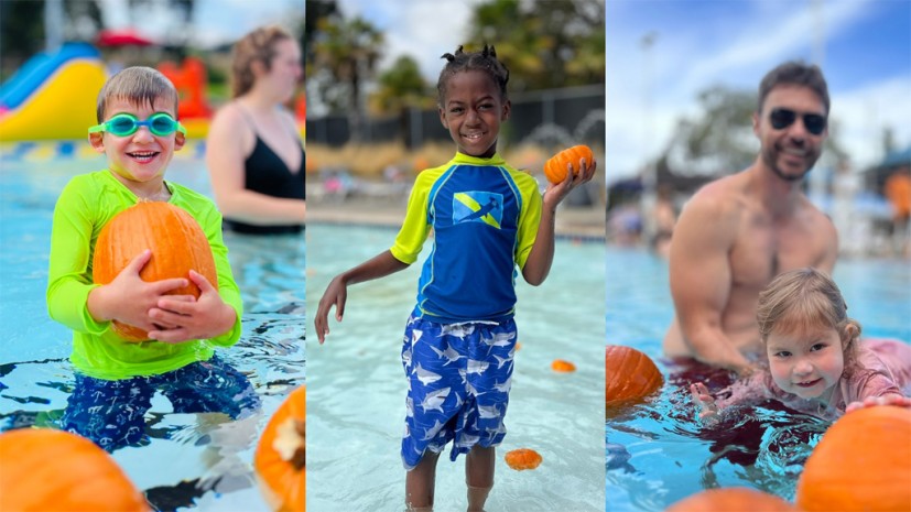 Families and kids in pool with pumpkins