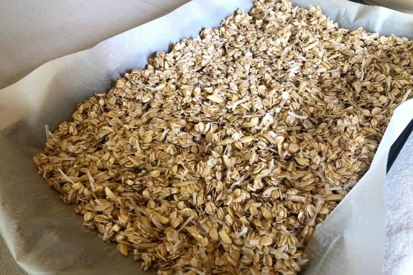 Granola ready to cook in baking sheet
