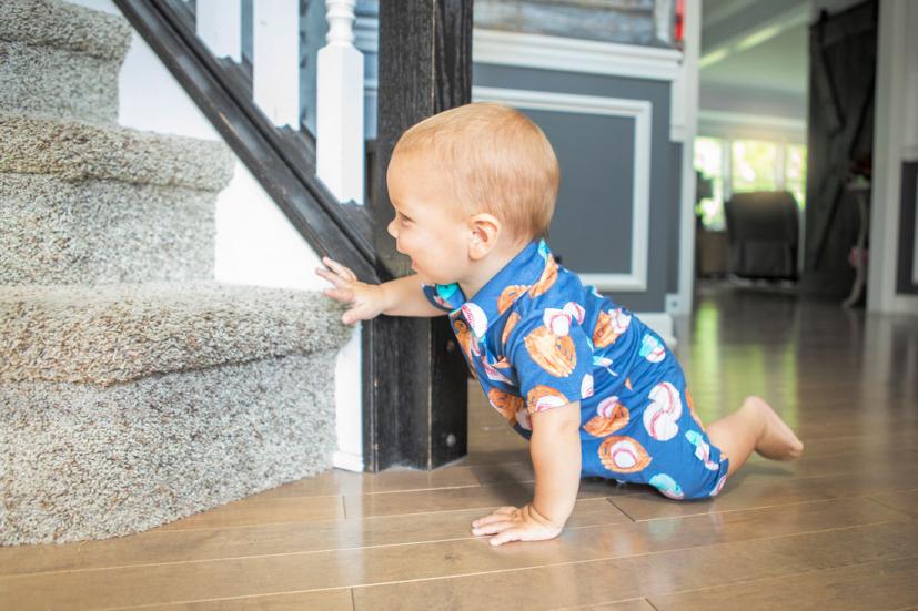 Baby crawling up stairs