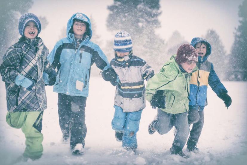 kids running in snow