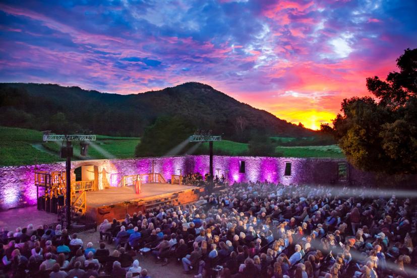 Outdoor stage with Sonoma Mountain and dramatic sunset