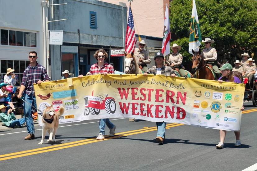 Marchers with banner at Western Weekend Parade in Point Reyes Station