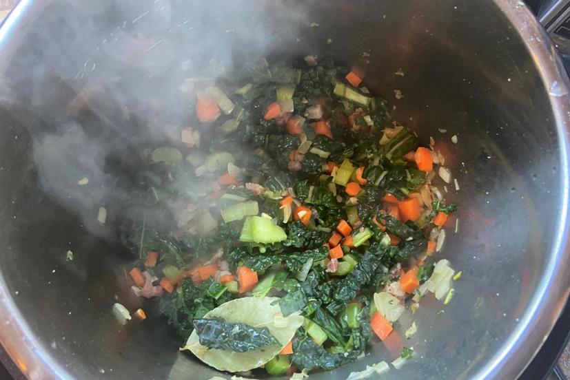 Instant pot white bean and kale soup cooking 