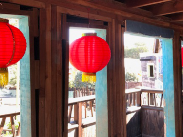Chinese lanterns hanging in window