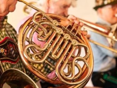 German brass band wearing Lederhosen and Tracht 
