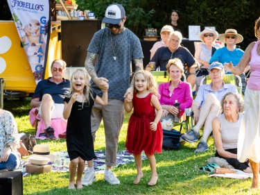 Family with kids watching band at Marin Art and Garden Center Summer Music Series